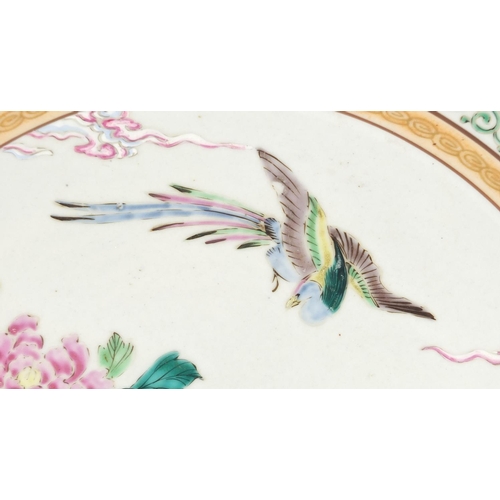 638 - Japanese porcelain charger, hand painted with a bird of paradise amongst flowers, painted and impres... 