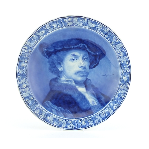 639 - Delft pottery charger decorated with a portrait of Rembrandt, painted marks to the reverse, 40.5cm i... 