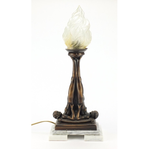 2167 - Bronzed and marble table lamp in the form of two nude Art Deco females with flame design glass shade... 