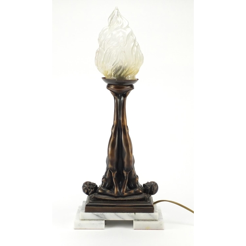 2167 - Bronzed and marble table lamp in the form of two nude Art Deco females with flame design glass shade... 
