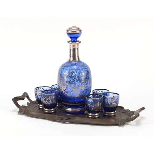 2258 - Art Nouveau design bronzed schnapps set with silver overlaid decanter and six glasses, the tray 32cm... 
