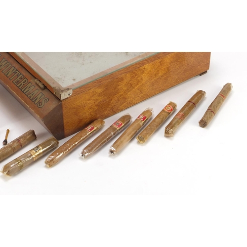 2176 - Henri Wintermans advertising cigar display case and a group of cigars, 10cm H x 27cm W x 36.5cm D