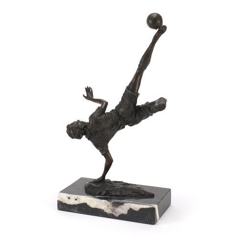 2178 - Patinated bronze figure of a footballer raised on a rectangular marble base, 35.5cm high