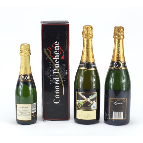 2315 - Three bottles of champagne comprising Moët & Chandon, Lanson and Canard-Duchene
