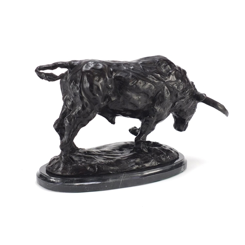 2302 - Patinated bronze model of a bull raised on a shaped black marble base, 35cm wide