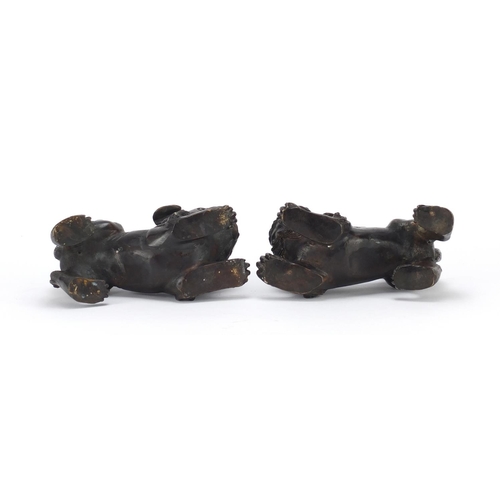 2298 - Pair of Chinese patinated bronze Foo Dogs, each 16.5cm wide