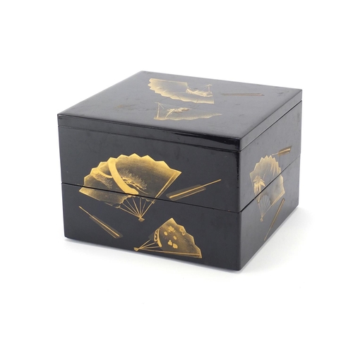 2267 - Japanese black lacquer sectional box gilded with fan motifs, 16cm H x 22.5cm W x 21cm D