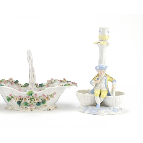 2203 - Pair of continental porcelain figural candlesticks and a similar basket hand painted with flowers, t... 