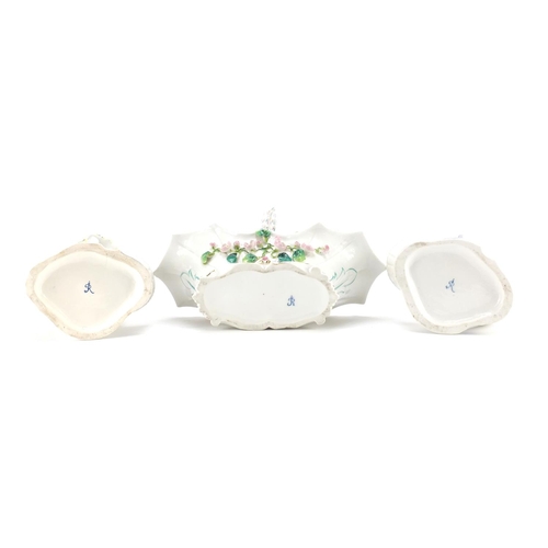 2203 - Pair of continental porcelain figural candlesticks and a similar basket hand painted with flowers, t... 