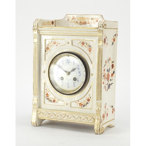 2105 - Continental porcelain clock case housing a Japy Freres movement, retailed by J W Benson, 30.5cm high