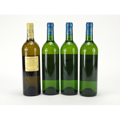 2228 - Four bottles of wine comprising three bottles of 2000 Chatau De Fieuzal Blanc Pessac Leognan and one... 