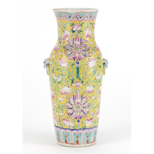 2065 - Chinese porcelain vase with ring turned handles, hand painted with flower heads amongst foliate scro... 