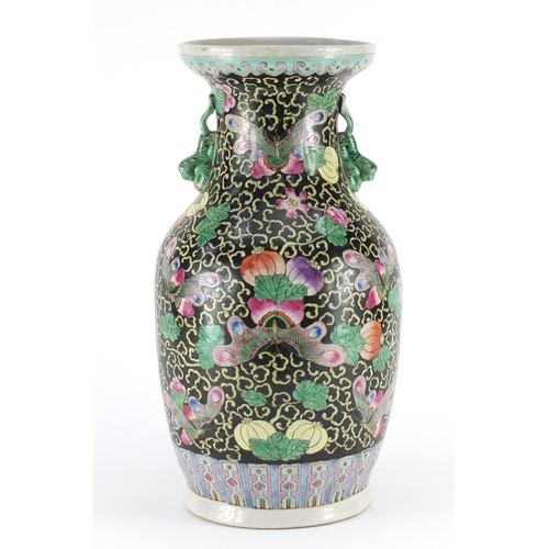 2293 - Chinese porcelain vase with twin handles, hand painted in the famille noir palette with butterflies ... 