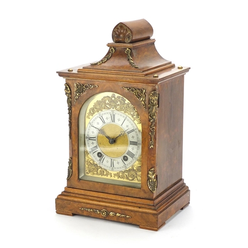 2048 - Burr walnut cased bracket clock, with gilt brass mounts striking on two gongs, the ornate face havin... 