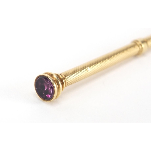 2411 - S Mordan & Co unmarked gold propelling pencil with amethyst top, 8.5cm in length, 8.8g
