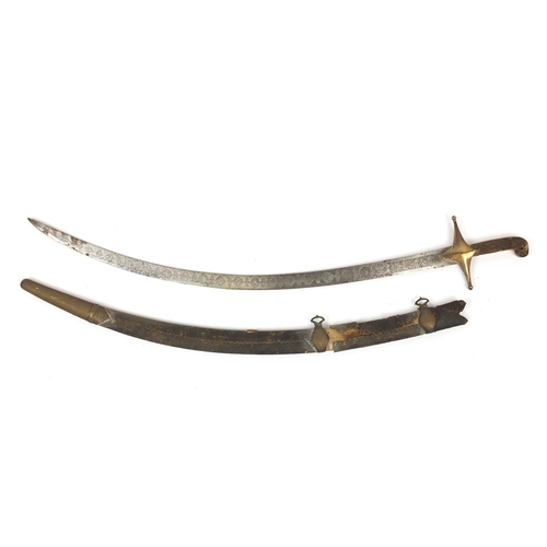 2486 - Antique Islamic Shamshir with bone handle, engraved steel blade and scabbard, the Shamshir 98.5cm in... 