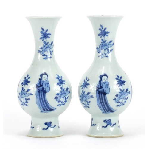 2067 - Pair of Chinese porcelain baluster vases, each hand painted with four females and flowers above Daoi... 