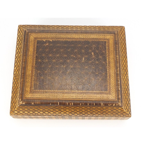 2104 - Japanese straw work box, the lift off lid with geometric designs enclosing six boxes and covers, 10c... 