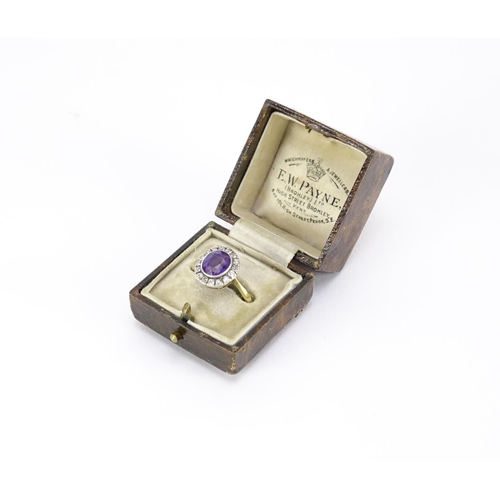 2592 - 18ct gold amethyst and diamond ring, housed in an E W Payne tooled leather box, size Q, 3.4g