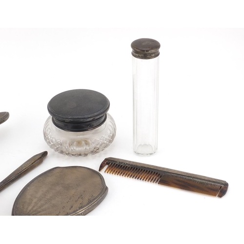 2539 - Silver mounted vanity items including a pair of brushes, hand mirror and cut glass powder pot, vario... 