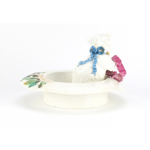 2358 - Victorian pottery cat in a straw hat, hand painted with a blue bow and holding a pink ribbon, 22cm i... 