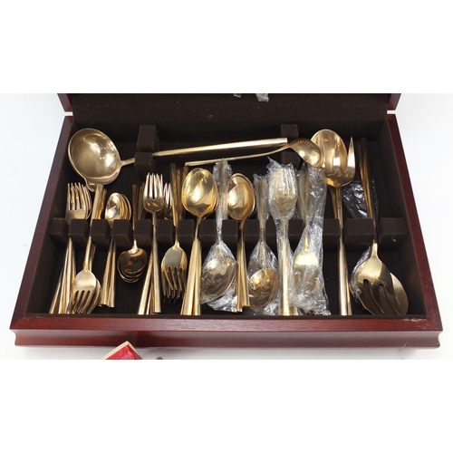 2177 - Mahogany eight place canteen of bronze cutlery and a boxed cake slice, the canteen 48cm wide