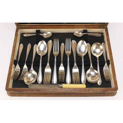 2189 - 1930's oak six place canteen of Sheffield silver plated cutlery, the canteen 40cm wide