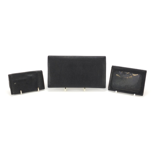 2139 - Vintage Christian Dior leather purse, card holder and key wallet, the largest 18.5cm wide