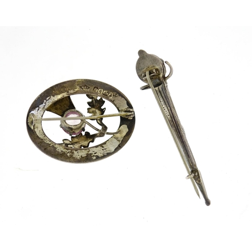 2569 - Two Scottish silver brooches, one set with hardstone, the largest 6.5cm in length, 13.5g