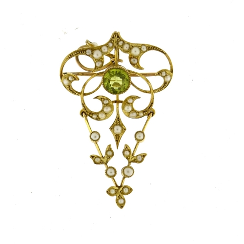 2576 - Art Nouveau unmarked gold peridot and seed pearl pendant brooch, 4.5cm in length, 4.2g