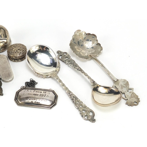 2511 - Silver and white metal objects including a pair of continental silver spoons, spinning top, pill box... 