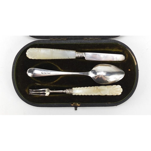 2531 - Matched Georgian silver knife, fork and spoon Christening set, housed in a tooled leather case, the ... 