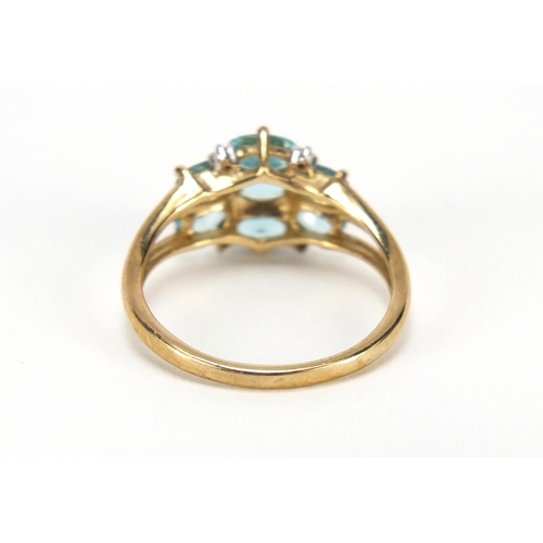 2599 - 9ct gold blue stone and diamond ring, size M, 2.3g