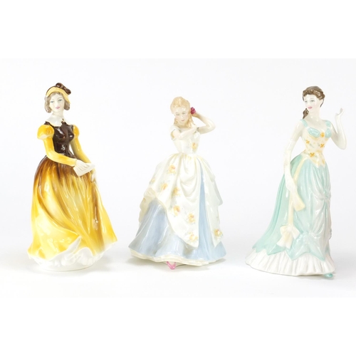 2121 - Four collectable figurines comprising two Coalport and two Royal Doulton, the largest 19cm high