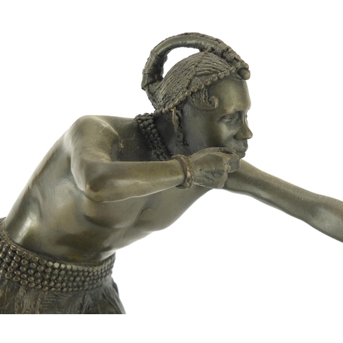 2098 - Patinated bronze figure of an African tribesman with a bow, raised on a rectangular black marble bas... 