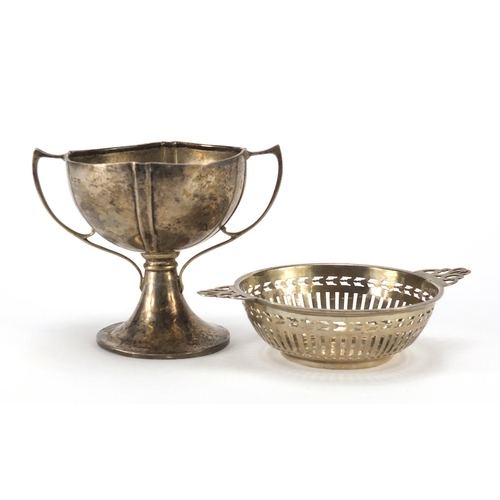 2537 - Silver twin handled trophy and pierced bon bon dish, Birmingham hallmarks, the trophy 9.5cm high, 14... 