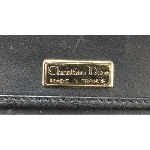 2138 - Vintage Christian Dior including handbag, purse, coin purse and key wallet, the largest 23cm wide