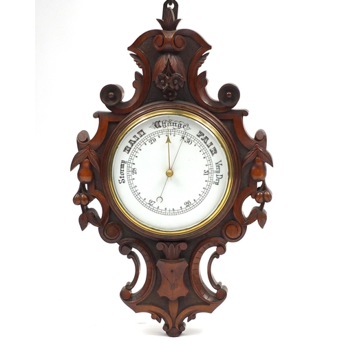 2019 - Victorian walnut wall barometer carved with leaves and berries, 58cm high