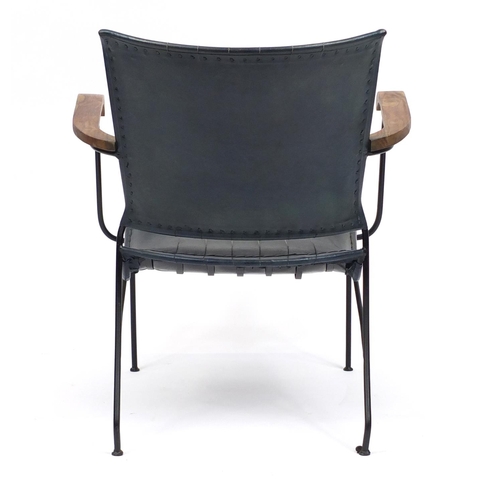 2005 - Industrial style metal framed armchair with leather upholstery, 74cm high