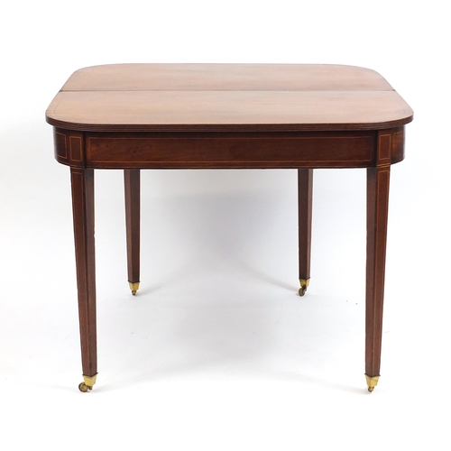 2014 - Edwardian inlaid mahogany fold over tea table, raised on tapering legs, 72cm H x 91cm W x 45cm D (fo... 