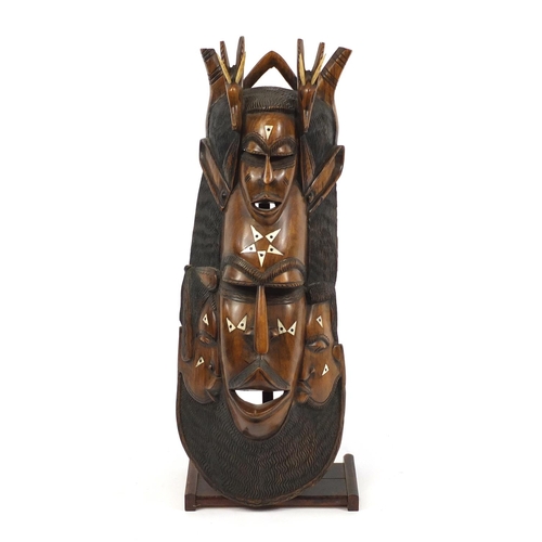 2125 - Large floor standing tribal interest carved wood mask, overall 81cm high