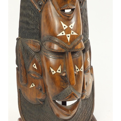 2125 - Large floor standing tribal interest carved wood mask, overall 81cm high