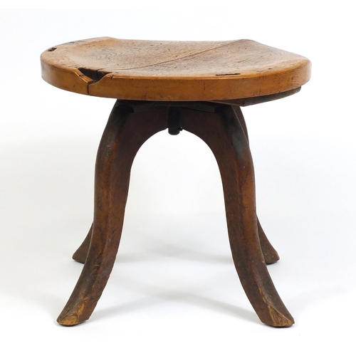 145 - Oak swivel stool, 44cm high x 50cm in diameter