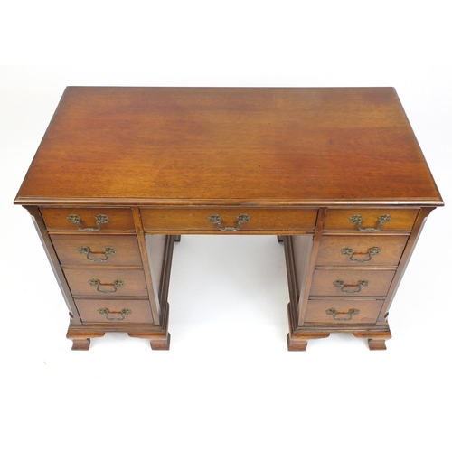19A - Oak twin pedestal desk fitted with eight drawers, 75cm H x 110cm W x 55cm D