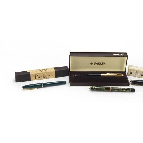 66 - Fountain pens and propelling pencils including a green marbleised Parker Duofold, Parker Max and Par... 