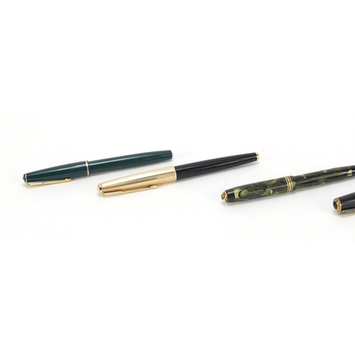 66 - Fountain pens and propelling pencils including a green marbleised Parker Duofold, Parker Max and Par... 