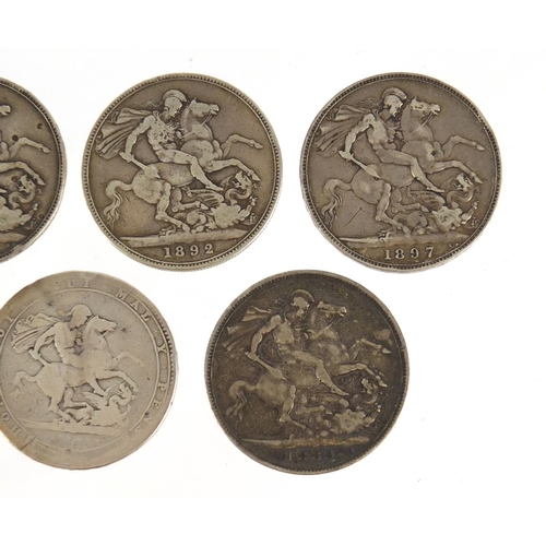 178 - Seven George III and later crowns comprising dates 1819, 1888, 1889, 1889, 1892, 1897 and 1898