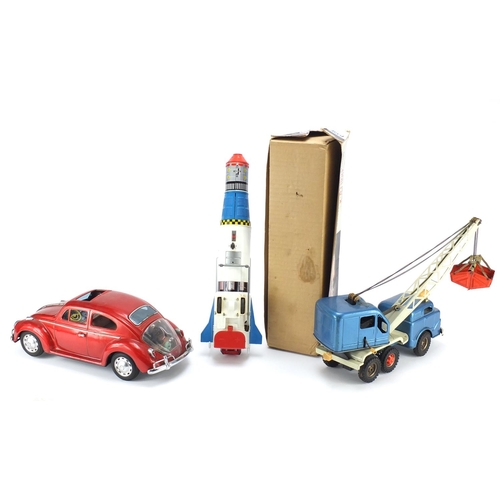 127 - Vintage toys including a Japanese battery operated Apollo-X Moon Challenger with box and a Japanese ... 