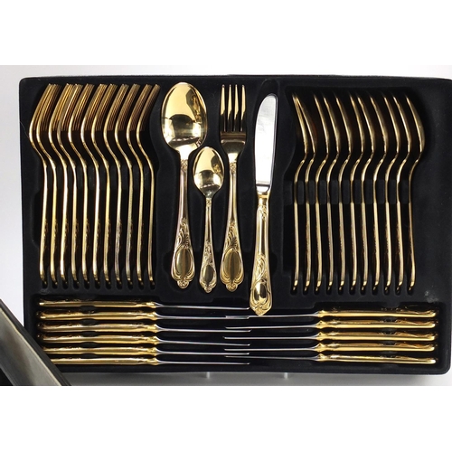 2035 - Twelve place canteen of gold plated cutlery by SBS, 46cm wide
