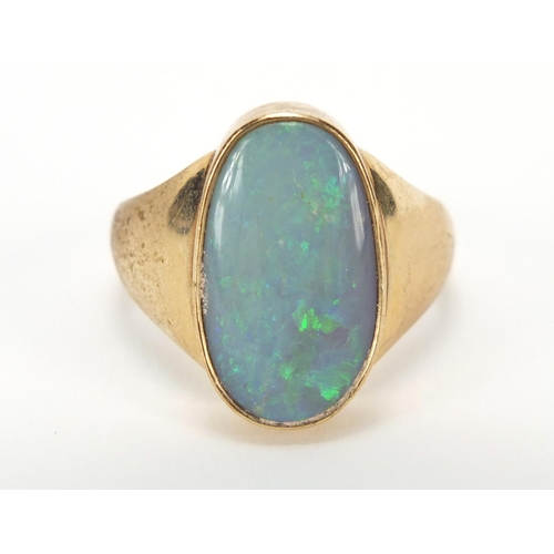 657 - 9ct gold cabochon opal ring, E.W.N Birmingham, 1919, size V, 8.8g